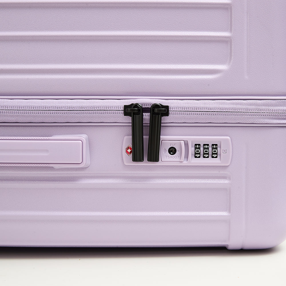 TSA approved lock detail on hard-shell suitcase