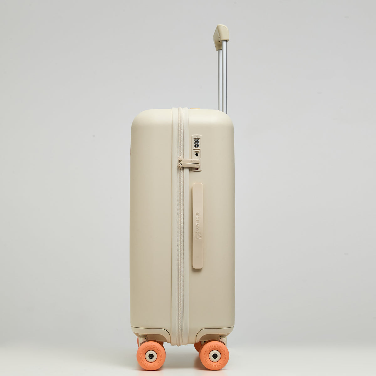 Close-up of Lovetour cream white suitcase side detail showing built-in combination lock, zipper, and brand logo carry handle