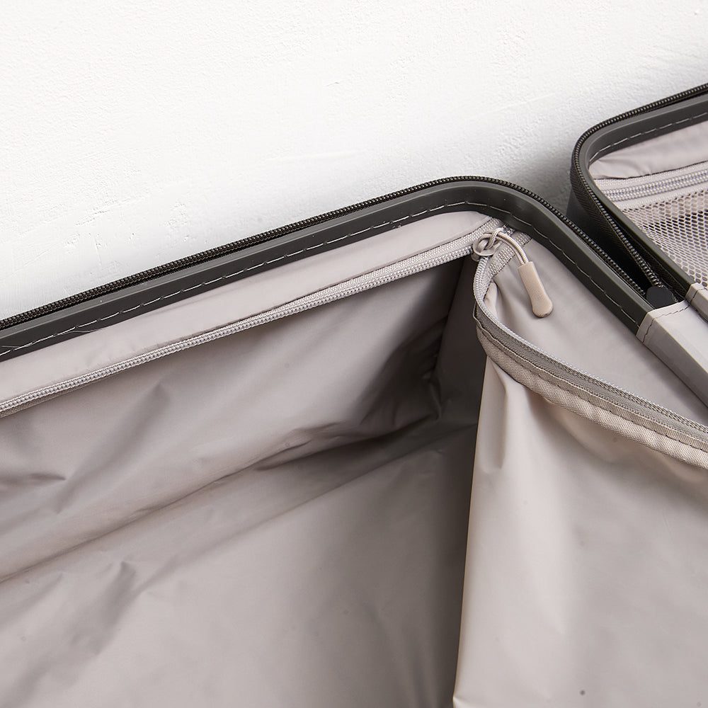 Interior zipper pocket detail on Lovetour luggage lining, showcasing high-quality fabric and stitching