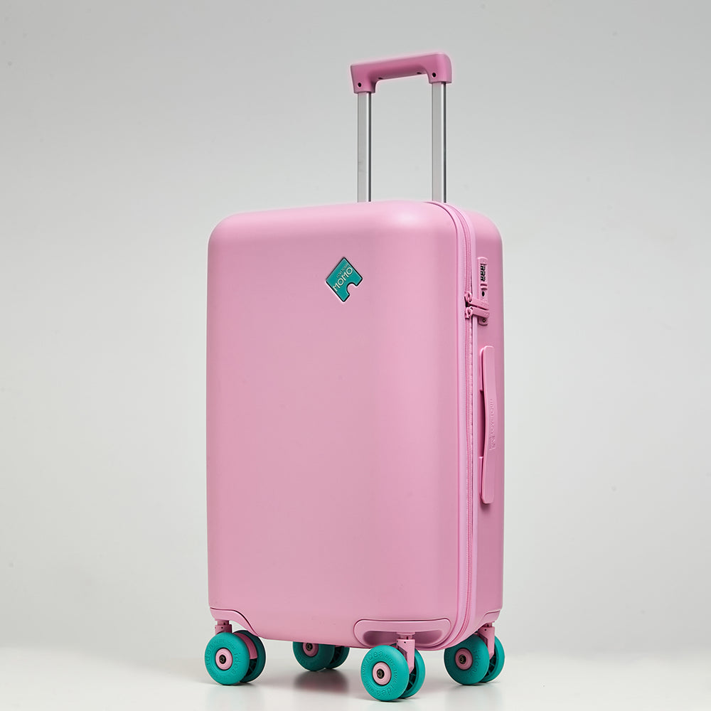 Lovetour pink spinner luggage with turquoise wheels, 45-degree angle view showing TSA lock and side handle