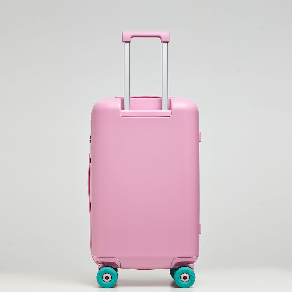 Back view of Lovetour pink hardside suitcase with extended silver aluminum trolley handle