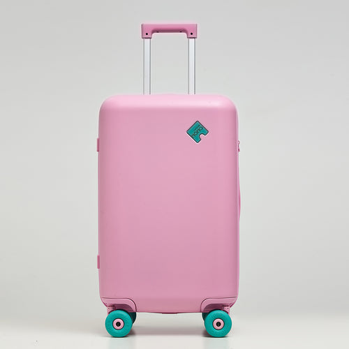 Front view of Lovetour pink spinner suitcase with green puzzle-shaped logo and matching turquoise wheels