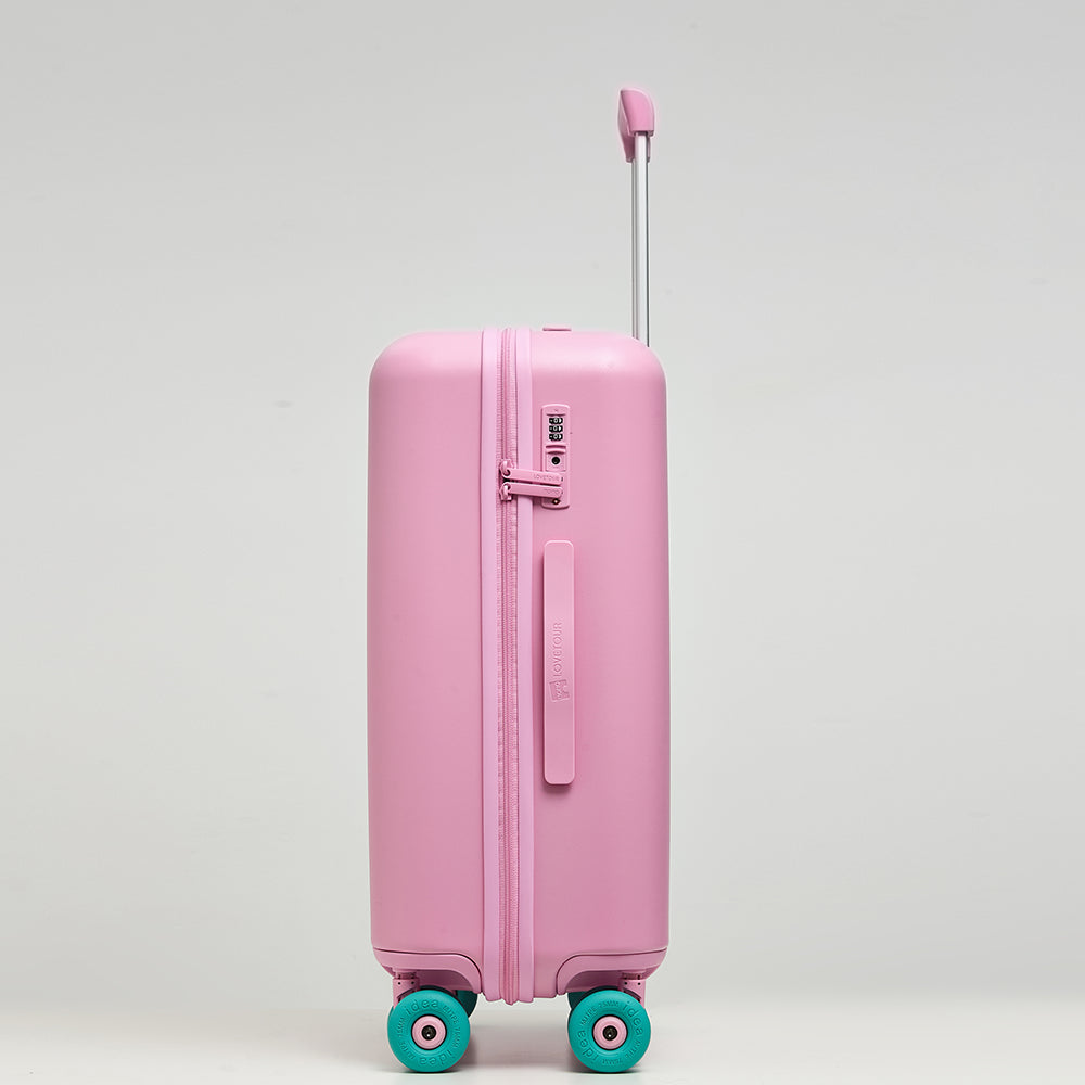 Close-up of Lovetour pink suitcase side showing built-in combination lock, zipper, and brand logo handle